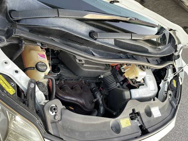 トヨタ ヴェルファイア ハイブリット X 新潟県 2012(平24)年 11万km ホワイトパールクリスタルシャイン コーナーセンサー/キセノンヘッドライト/両側パワスラ　/社外ナビ/BT/CD/USB/ビルトインETC/ipod/フルセグTV/3列シート/オットマン/純正AW/純正フロアマット/カーテンエアバック