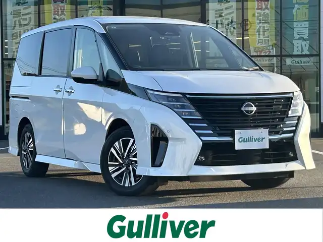 日産 セレナ ハイウェイスター V 岡山県 2023(令5)年 7万km プリズムホワイト 登録時走行距離70242km/純正12.3インチナビ/フルセグTV(AM.FM.TV.BT)/AppleCarPlay/両側パワースライドドア/アラウンドビューモニター/デジタルインナーミラー/純正ドライブレコーダー/純正防水シート/ETC2.0/プロパイロット/クリアランスソナー/衝突軽減ブレーキ/横滑り防止装置/クルーズコントロール(追従走行あり)/車線逸脱警報（レーンキープアシスト）/オートライト/オートマチックハイビーム/デュアルバックドア/アイドリングストップ/16インチ純正AW/純正フロアマット