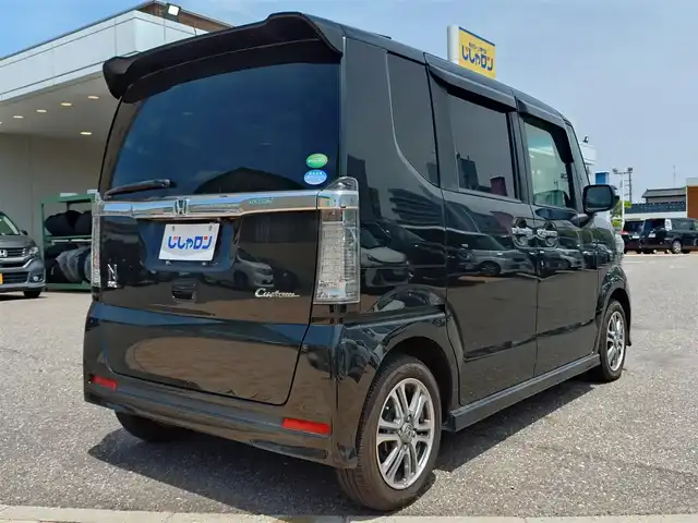 ホンダ Ｎ ＢＯＸ カスタム G Lパッケージ 新潟県 2016(平28)年 7.1万km スマートブラック (株)IDOMが運営する【じしゃロン新潟店】の自社ローン専用車両になります。/こちらは現金またはオートローンご利用時の価格です。自社ローンご希望の方は別途その旨お申付け下さい/純正ナビ/FM/AM/CD/DVD視聴可能/ワンセグTV視聴可能(走行中視聴可能)/Bluetooth接続可能/バックカメラ/ETC/両側パワースライドドア/プッシュスタート/前後ドライブレコーダー(品番：MDR-CAM2)/電動格納ウィンカーミラー/純正フロアマット/衝突被害軽減システム/横滑り防止装置/スマートキー/スペアキー×１/取扱説明書