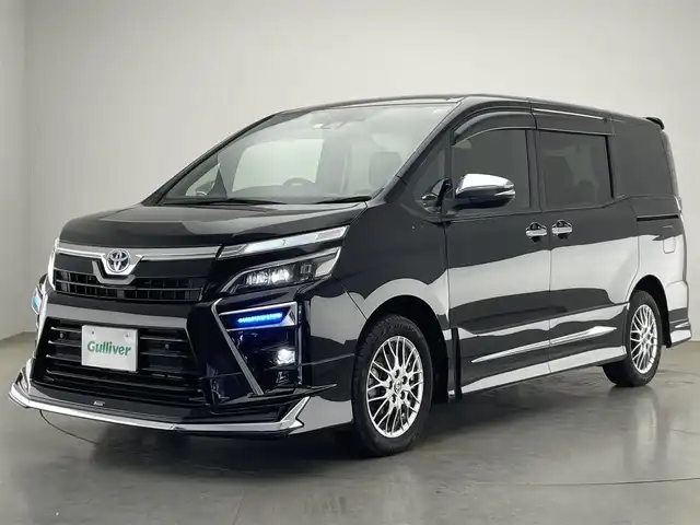 トヨタ ヴォクシー ハイブリッド ZS 煌Ⅱ 愛知県 2020(令2)年 6.9万km ブラック 純正１０型ナビ　フルセグＴＶ　純正後席モニター　モデリスタエアロ　シートヒーター　両側パワースライド　前後ドラレコ　ＥＴＣ　クルコン　セーフティセンス　衝突軽減装置　ＬＥＤオートライト　フォグ　コーナーセンサー　禁煙車