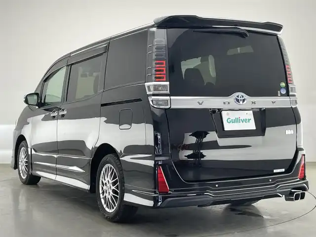 トヨタ ヴォクシー ハイブリッド ZS 煌Ⅱ 愛知県 2020(令2)年 6.9万km ブラック 純正１０型ナビ　フルセグＴＶ　純正後席モニター　モデリスタエアロ　シートヒーター　両側パワースライド　前後ドラレコ　ＥＴＣ　クルコン　セーフティセンス　衝突軽減装置　ＬＥＤオートライト　フォグ　コーナーセンサー　禁煙車