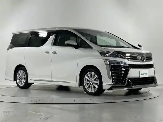 トヨタ ヴェルファイア Z 佐賀県 2019(令1)年 3.2万km ホワイトパールクリスタルシャイン モデリスタエアロ /アルパイン11インチナビ(EX11Z)/CD/DVD/フルセグTV/Bluetooth/バックカメラ /両側パワースライドドア/クルーズコントロール/ETC/前後ドライブレコーダー/クリアランスソナー /LEDライト/オートライト/フォグライト /純正18インチアルミホイール/純正フロアマット/スマートキー/スペアキー/電動格納ミラー/ステアリングリモコン/社外GPSレーダー