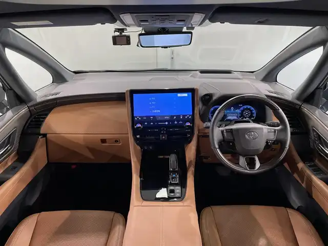 トヨタ ヴェルファイア ハイブリット Z プレミア 愛知県 2023(令5)年 2.1万km ブラック 純正１４インチディスプレイオーディオＰｌｕｓ　/（Bluetooth/フルセグTV/FM/AM/CarPlay/USB)/左右独立ムーンルーフ　/パノラミックビューモニター　/茶革シート　/トヨタチームメイト/　　-アドバンスパーク/アドバンスドライブ/　　-パーキングサポートブレーキ/トヨタセーフティセンス/　　-プリクラッシュセーフティ/　　-レーントレーニングアシスト＋レーンディパーチャーアラート/　　-レーダークルーズコントロール（ACC)/　　-アダプティブハイビームシステム［AHS］/　　-ロードサインアシスト［RSA］/　　-発進遅れ告知機能/両側パワースライドドア/ヘッドアップディスプレイ/ブラインドスポットモニター（BSM)/ビルトインＥＴＣ２．０/ＡＣ１００Ｖ　/置くだけ充電　/シートヒーター/シートベンチレーション/1.2列目パワーシート/ステアリングヒーター/電動バックドア/LEDヘッドライト/LEDフォグランプ/前後ドライブレコーダー/パドルシフト