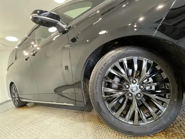 トヨタ ヴェルファイア ハイブリット Z プレミア 愛知県 2023(令5)年 2.1万km ブラック 純正１４インチディスプレイオーディオＰｌｕｓ　/（Bluetooth/フルセグTV/FM/AM/CarPlay/USB)/左右独立ムーンルーフ　/パノラミックビューモニター　/茶革シート　/トヨタチームメイト/　　-アドバンスパーク/アドバンスドライブ/　　-パーキングサポートブレーキ/トヨタセーフティセンス/　　-プリクラッシュセーフティ/　　-レーントレーニングアシスト＋レーンディパーチャーアラート/　　-レーダークルーズコントロール（ACC)/　　-アダプティブハイビームシステム［AHS］/　　-ロードサインアシスト［RSA］/　　-発進遅れ告知機能/両側パワースライドドア/ヘッドアップディスプレイ/ブラインドスポットモニター（BSM)/ビルトインＥＴＣ２．０/ＡＣ１００Ｖ　/置くだけ充電　/シートヒーター/シートベンチレーション/1.2列目パワーシート/ステアリングヒーター/電動バックドア/LEDヘッドライト/LEDフォグランプ/前後ドライブレコーダー/パドルシフト