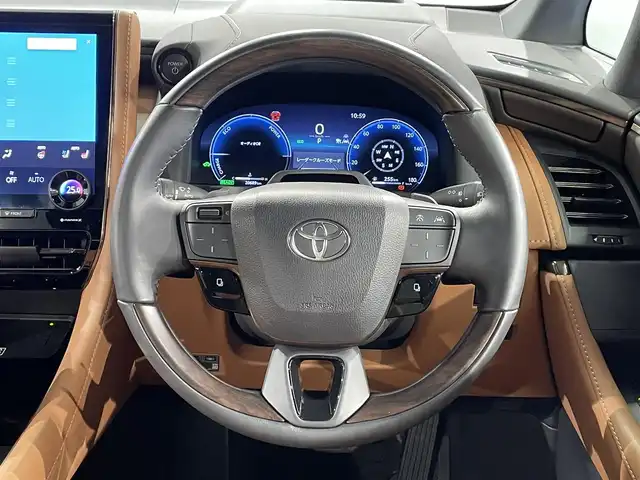 トヨタ ヴェルファイア ハイブリット Z プレミア 愛知県 2023(令5)年 2.1万km ブラック 純正１４インチディスプレイオーディオＰｌｕｓ　/（Bluetooth/フルセグTV/FM/AM/CarPlay/USB)/左右独立ムーンルーフ　/パノラミックビューモニター　/茶革シート　/トヨタチームメイト/　　-アドバンスパーク/アドバンスドライブ/　　-パーキングサポートブレーキ/トヨタセーフティセンス/　　-プリクラッシュセーフティ/　　-レーントレーニングアシスト＋レーンディパーチャーアラート/　　-レーダークルーズコントロール（ACC)/　　-アダプティブハイビームシステム［AHS］/　　-ロードサインアシスト［RSA］/　　-発進遅れ告知機能/両側パワースライドドア/ヘッドアップディスプレイ/ブラインドスポットモニター（BSM)/ビルトインＥＴＣ２．０/ＡＣ１００Ｖ　/置くだけ充電　/シートヒーター/シートベンチレーション/1.2列目パワーシート/ステアリングヒーター/電動バックドア/LEDヘッドライト/LEDフォグランプ/前後ドライブレコーダー/パドルシフト