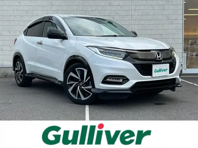 ホンダ ヴェゼル RS ホンダセンシング 静岡県 2019(令1)年 4.1万km プラチナホワイトパール 純正8インチナビ/（AM/FM/CD/DVD/BT/AppleCarPlay/HDMI)/フルセグTV/走行中視聴可能TV/バックカメラ/ホンダセンシング/・横滑り防止装置/・レーンキープアシスト/・衝突被害軽減システム/・レーダークルーズコントロール/ハーフレザーシート/前席シートヒーター/ビルトインETC/プッシュスタート/スマートキー/スペアキー×1/盗難防止装置/純正18インチアルミホイール/純正フロアマット/LEDヘッドライト