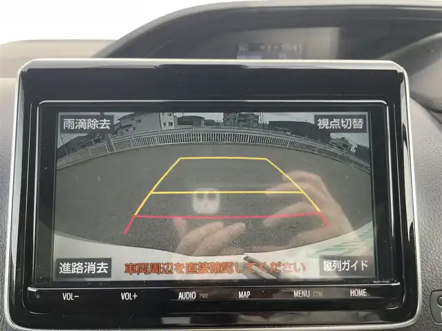 トヨタ ノア Si ダブルバイビーⅢ 群馬県 2021(令3)年 1万km ホワイトパールクリスタルシャイン ワンオーナー　/純正9インチナビ/(AM/FM/BT/TV/DISC/SD)/純正12/1型フリップダウン/両側パワースライドドア/バックカメラ/ETC2.0/トヨタセーフティーセンス/プリクラッシュセーフティー/レーンディパーチャーアラート/パーキングサポートブレーキ/クルーズコントロール/クリアランスソナー/先行車発進お知らせ機能/横滑り防止機能/アイドリングストップ/AUTOライト/AUTOハイビーム/ステアリングリモコン/純正フロアマット/純正ドアバイザー/ウッド調コンビハンドル/取扱説明書/保証書/スペアキー