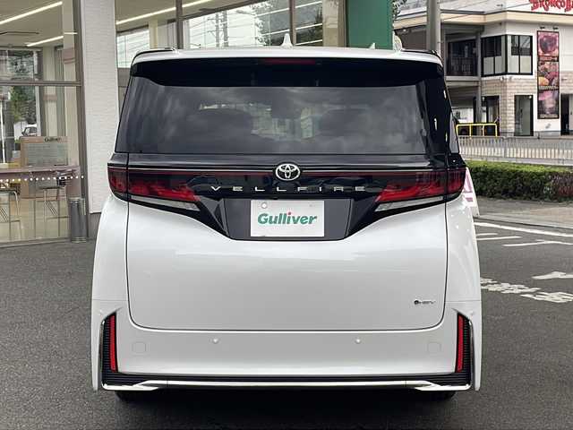 トヨタ ヴェルファイア ハイブリット Z プレミア 愛知県 2025(令7)年 0.5万km プラチナホワイトパールマイカ /ワンオーナー//純正ディスプレイオーディオコネクティッドナビ対応//フルセグTV・Bluetooth・HDMI・miracast//純正フリップダウンモニター//デジタルインナーミラー//両側パワースライドドア//左右独立サンルーフ//レーダークルーズコントロール//パワーシート・メモリーシート//シートヒーター・エアーシート//ステアリングヒーター//置くだけ充電//全方位カメラ//パドルシフト//オートライト・オートハイビーム//コーナーセンサー//ビルトインETC２．０//パワーバックドア//照明付きバニティミラー//純正フロアマット//オートリトラクタブルウインカーミラー//フォグランプ//三眼LEDヘッドライト//トヨタチームメイト//トヨタセーフティセンス//プロアクティブドライビングアシスト//レーンディパーチャーアラート//ドライバーモニター//プリクラッシュセーフティ//フロントクロストラフィックアラート//ドライブスタートコントロール//安心降車アシスト//ロードサインアシスト//先行者発進告知//後送品（保証書・スペアキー）