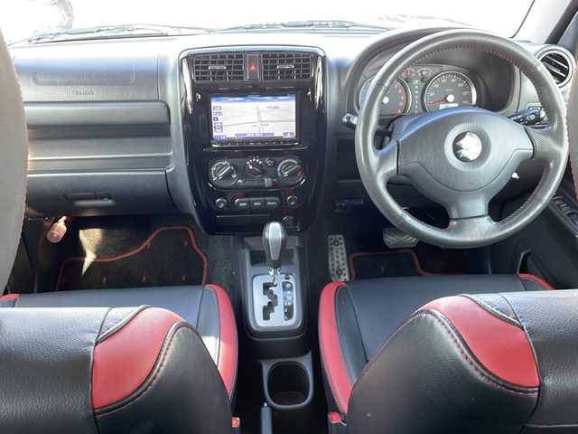 スズキ ジムニー クロスアドベンチャー 徳島県 2013(平25)年 3.7万km ブルーイッシュブラックパール3 7インチナビ【AVIC-MRZ03】/（ワンセグ/AM/FM）/バックカメラ/合皮シート/シートヒーター/背面スペアタイヤ/エアコン/パワーウィンドウ/ハロゲンヘッドライト/ETC/純正AW/ドアバイザー/Wエアバッグ/リモコンキー