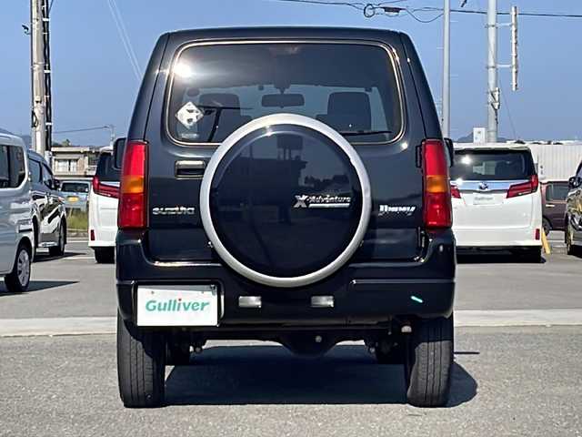 スズキ ジムニー クロスアドベンチャー 徳島県 2013(平25)年 3.7万km ブルーイッシュブラックパール3 7インチナビ【AVIC-MRZ03】/（ワンセグ/AM/FM）/バックカメラ/合皮シート/シートヒーター/背面スペアタイヤ/エアコン/パワーウィンドウ/ハロゲンヘッドライト/ETC/純正AW/ドアバイザー/Wエアバッグ/リモコンキー