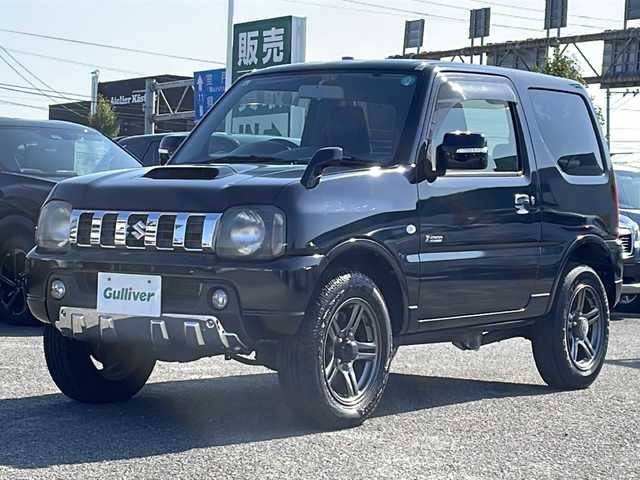 スズキ ジムニー クロスアドベンチャー 徳島県 2013(平25)年 3.7万km ブルーイッシュブラックパール3 7インチナビ【AVIC-MRZ03】/（ワンセグ/AM/FM）/バックカメラ/合皮シート/シートヒーター/背面スペアタイヤ/エアコン/パワーウィンドウ/ハロゲンヘッドライト/ETC/純正AW/ドアバイザー/Wエアバッグ/リモコンキー