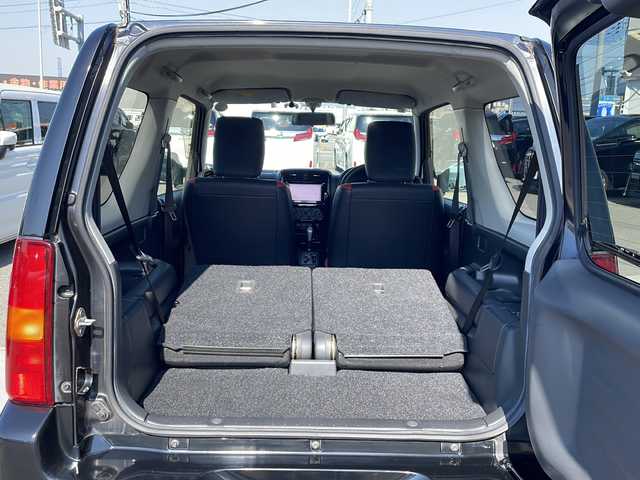 スズキ ジムニー クロスアドベンチャー 徳島県 2013(平25)年 3.7万km ブルーイッシュブラックパール3 7インチナビ【AVIC-MRZ03】/（ワンセグ/AM/FM）/バックカメラ/合皮シート/シートヒーター/背面スペアタイヤ/エアコン/パワーウィンドウ/ハロゲンヘッドライト/ETC/純正AW/ドアバイザー/Wエアバッグ/リモコンキー