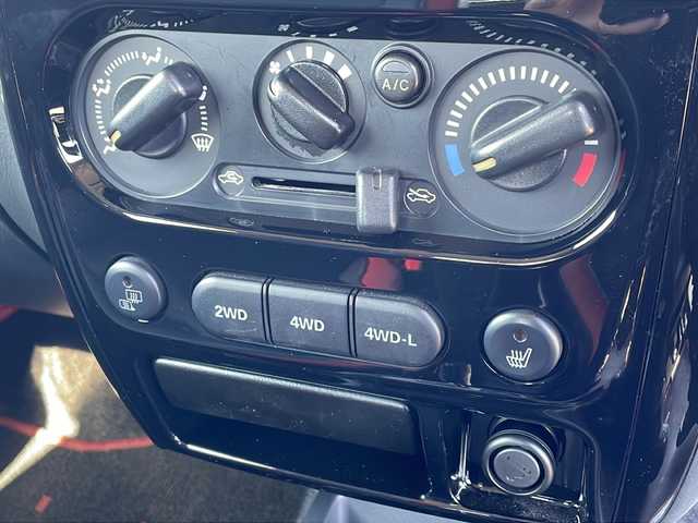 スズキ ジムニー クロスアドベンチャー 徳島県 2013(平25)年 3.7万km ブルーイッシュブラックパール3 7インチナビ【AVIC-MRZ03】/（ワンセグ/AM/FM）/バックカメラ/合皮シート/シートヒーター/背面スペアタイヤ/エアコン/パワーウィンドウ/ハロゲンヘッドライト/ETC/純正AW/ドアバイザー/Wエアバッグ/リモコンキー