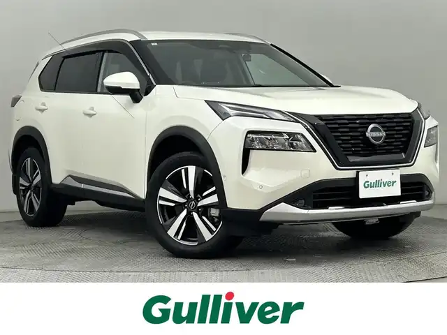 日産 エクストレイル G e－4ORCE 道央・札幌 2024(令6)年 1万km ブリリアントホワイトパール ・４WD/・純正メモリーナビゲーション/　BT/USB/AppleCarPlay/フルセグ/・社外ドライブレコーダー前後（SN-TW86）/・ビルトインETC2.0/・ワイヤレス充電/・アラウンドビューモニター/・エマージェンシーブレーキ/・プロパイロット/・レーダークルーズコントロール/・リアクロストラフィックアラート/・駐車支援/・デジタルインナーミラー/・HUD/・オートブレーキホールド/・横滑り防止装置/・前後コーナーセンサー/・前席パワーシート（D席メモリ付）/・レザーシート/・全席シートヒーター/・ステアリングヒーター/・オートライト/・LEDヘッドライト/・オートマチックハイビーム/・純正フロアマット/・スマートキー/・プッシュスタート/・スペアキー1本/・ルーフレール/・純正AW19インチ/・保証書あり/・取説あり