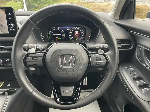 ホンダ ＺＲ－Ｖ ハイブリッド 富山県 2024(令6)年 3.2万km クリスタルブラックパール ４ＷＤ／/アラウンドビューモニター／/メーカーナビ／/フルセグＴＶ／/Ｂｌｕｅｔｏｏｔｈ／/前席パワーシート／/全席シートヒーター／/ステアリングヒーター／/ビルトインＥＴＣ／/パワーバックドア／/パドルシフト