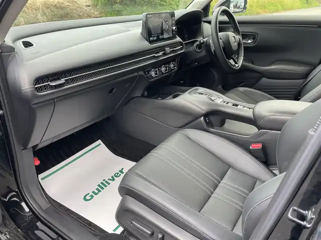 ホンダ ＺＲ－Ｖ ハイブリッド 富山県 2024(令6)年 3.2万km クリスタルブラックパール ４ＷＤ／/アラウンドビューモニター／/メーカーナビ／/フルセグＴＶ／/Ｂｌｕｅｔｏｏｔｈ／/前席パワーシート／/全席シートヒーター／/ステアリングヒーター／/ビルトインＥＴＣ／/パワーバックドア／/パドルシフト