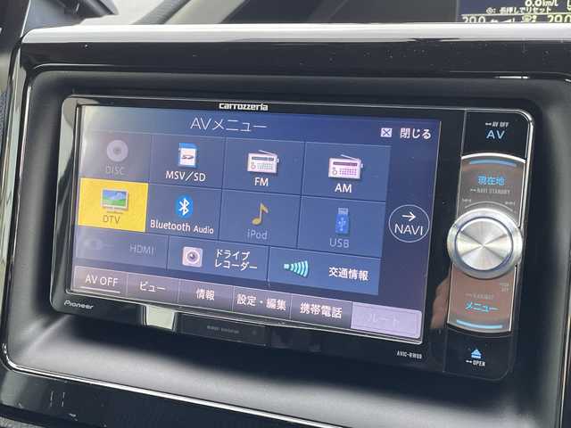 トヨタ ヴォクシー ZS 煌 新潟県 2015(平27)年 6.5万km ホワイトパールクリスタルシャイン 社外ナビ(AVIC-RW09)/(AM/FM/CD/DVD/Bluetooth)/フルセグTV/社外フリップダウンモニター/社外前後ドラレコ型デジタルインナーミラー/両側パワースライドドア/バックカメラ/純正フロアマット/ETC/プッシュスタート/スマートキー/スペアキー×1/LEDヘッドライト/オートライト/保証書