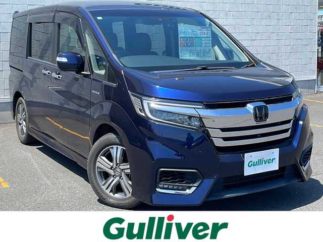 ホンダ ステップワゴン スパーダ ハイブリッド G EX ホンダセンシング 茨城県 2017(平29)年 5.5万km オブシダンブルーパール ホンダセンシング/純正フリップダウンモニター/純正ナビ/　　CD/DVD/BT/フルセグ/マルチビューカメラシステム/両側パワースライドドア/レーダークルーズコントロール/LEDオートライト/ハーフレザーシート/シートヒーター /純正16インチアルミホイール/電子パーキングブレーキ/ブレーキホールド/ステアリングスイッチ/スマートキー/ETC