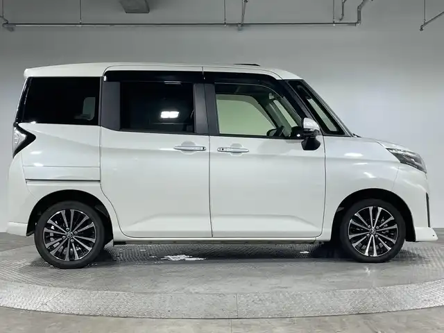 トヨタ ルーミー カスタムG－T 神奈川県 2021(令3)年 1.7万km パールホワイトⅢ ・純正９型SDナビゲーション【NSZT-Y68T】/＜フルセグ/AMFM/BT/CD/DVD/SDREC＞/・パノラミックビューモニター/・両側パワースライドドア/・社外前後ドライブレコーダー/・純正ビルトインETC2.0/・電動パーキングブレーキ/ブレーキホールド/・アイドリングストップ/・前席シートヒーター/・スマートキー/・プッシュスタート/・スペアキー/・2列目シートバックテーブル/・前後ソナー/・オートライト/オートハイビーム /・LEDヘッドライト/フォグ/・純正１５インチアルミホイール/・パノラミックビュー対応ナビレディパッケージ/・コンフォートパッケージ