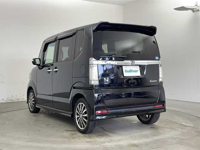 ホンダ Ｎ ＢＯＸ カスタム G ターボパッケージ 兵庫県 2012(平24)年 5.3万km クリスタルブラックパール ・社外ナビ/Bluetooth/CD/DVD/SD/USB/テレビ/・バックカメラ/・クルーズコントロール/・横滑り防止装置/・両側パワースライドドア/・ステアリングスイッチ/・パドルシフト/・フロアマット/・HIDヘッドライト/・オートライト/・純正15インチアルミホイールタイヤ/・スマートキー/・プッシュスタートボタン/・ドアバイザー/・Wエアバッグ/・電動格納ミラー