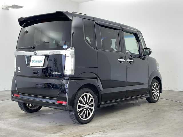 ホンダ Ｎ ＢＯＸ カスタム G ターボパッケージ 兵庫県 2012(平24)年 5.3万km クリスタルブラックパール ・社外ナビ/Bluetooth/CD/DVD/SD/USB/テレビ/・バックカメラ/・クルーズコントロール/・横滑り防止装置/・両側パワースライドドア/・ステアリングスイッチ/・パドルシフト/・フロアマット/・HIDヘッドライト/・オートライト/・純正15インチアルミホイールタイヤ/・スマートキー/・プッシュスタートボタン/・ドアバイザー/・Wエアバッグ/・電動格納ミラー