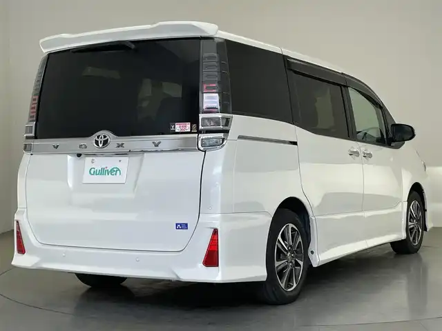 トヨタ ヴォクシー ZS 煌Ⅲ 愛知県 2021(令3)年 3.8万km ホワイトパールクリスタルシャイン 純正９型ナビ　フルセグＴＶ　Ｂｌｕｅｔｏｏｔｈ　純正後席モニター　両側パワスラドア　前後ドラレコ　ハーフレザー　クルコン　セーフティセンス　衝突軽減　車線逸脱　コーナーセンサー　ＬＥＤライト　禁煙車