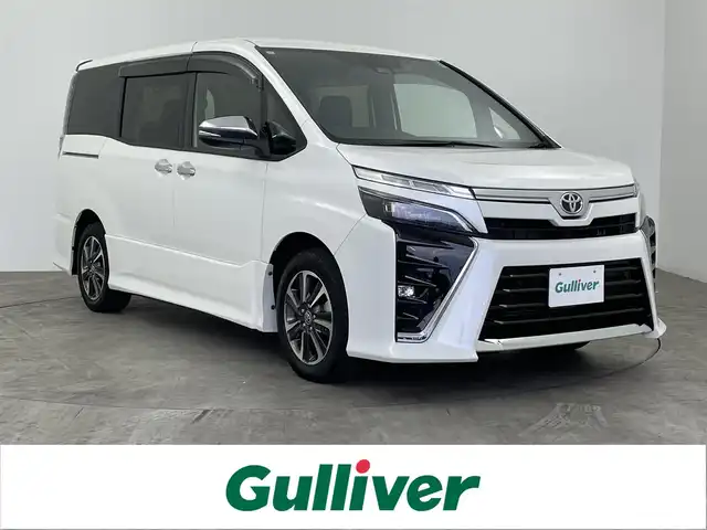 トヨタ ヴォクシー ZS 煌Ⅲ 大分県 2021(令3)年 3.8万km ホワイトパールクリスタルシャイン 純正９インチナビNSZT-Y68T/フルセグＴＶ/CD/DVD/Ｂｌｕｅｔｏｏｔｈ/AM/FM/純正後席モニター/両側パワースライドドア/前後ドラレコ/ハーフレザー/クルーズコントロール/トヨタセーフティセンス/コーナーセンサー/ＬＥＤライト