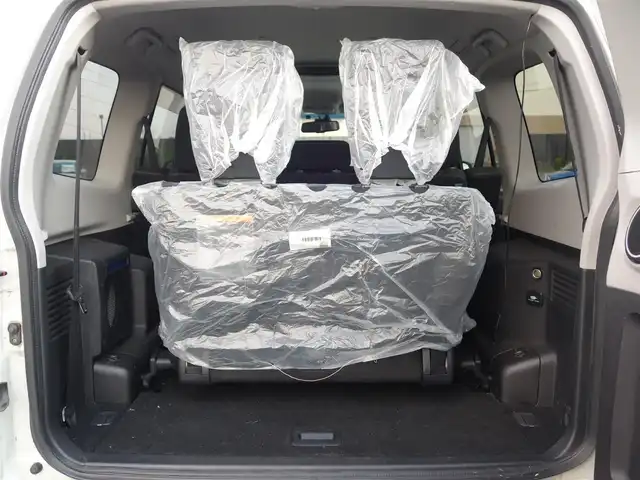 三菱 パジェロ ロング エクシード 山形県 2010(平22)年 10.6万km ウォームホワイトパール 4WD/ディーゼル/純正フリップダウンモニター/ロックフォードプレミアムサウンド/純正メモリナビ/　　【CD DVD BT フルセグ USB MSV】/バックカメラ/クルーズコントロール/HIDオートヘッドライト/シートヒーター/純正17インチアルミホイール/ステアリングスイッチ/MTモード付AT/ターボ/電動格納ウィンカーミラー/フォグランプ/リモコンキー/ETC