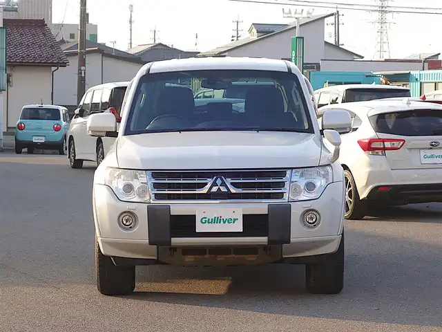 三菱 パジェロ ロング エクシード 山形県 2010(平22)年 10.6万km ウォームホワイトパール 4WD/ディーゼル/純正フリップダウンモニター/ロックフォードプレミアムサウンド/純正メモリナビ/　　【CD DVD BT フルセグ USB MSV】/バックカメラ/クルーズコントロール/HIDオートヘッドライト/シートヒーター/純正17インチアルミホイール/ステアリングスイッチ/MTモード付AT/ターボ/電動格納ウィンカーミラー/フォグランプ/リモコンキー/ETC