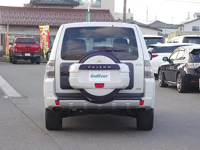 三菱 パジェロ ロング エクシード 山形県 2010(平22)年 10.6万km ウォームホワイトパール 4WD/ディーゼル/純正フリップダウンモニター/ロックフォードプレミアムサウンド/純正メモリナビ/　　【CD DVD BT フルセグ USB MSV】/バックカメラ/クルーズコントロール/HIDオートヘッドライト/シートヒーター/純正17インチアルミホイール/ステアリングスイッチ/MTモード付AT/ターボ/電動格納ウィンカーミラー/フォグランプ/リモコンキー/ETC