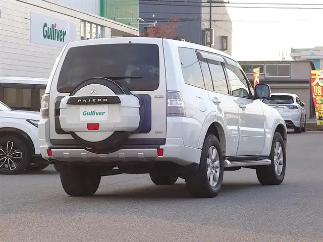 三菱 パジェロ ロング エクシード 山形県 2010(平22)年 10.6万km ウォームホワイトパール 4WD/ディーゼル/純正フリップダウンモニター/ロックフォードプレミアムサウンド/純正メモリナビ/　　【CD DVD BT フルセグ USB MSV】/バックカメラ/クルーズコントロール/HIDオートヘッドライト/シートヒーター/純正17インチアルミホイール/ステアリングスイッチ/MTモード付AT/ターボ/電動格納ウィンカーミラー/フォグランプ/リモコンキー/ETC
