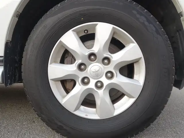 三菱 パジェロ ロング エクシード 山形県 2010(平22)年 10.6万km ウォームホワイトパール 4WD/ディーゼル/純正フリップダウンモニター/ロックフォードプレミアムサウンド/純正メモリナビ/　　【CD DVD BT フルセグ USB MSV】/バックカメラ/クルーズコントロール/HIDオートヘッドライト/シートヒーター/純正17インチアルミホイール/ステアリングスイッチ/MTモード付AT/ターボ/電動格納ウィンカーミラー/フォグランプ/リモコンキー/ETC