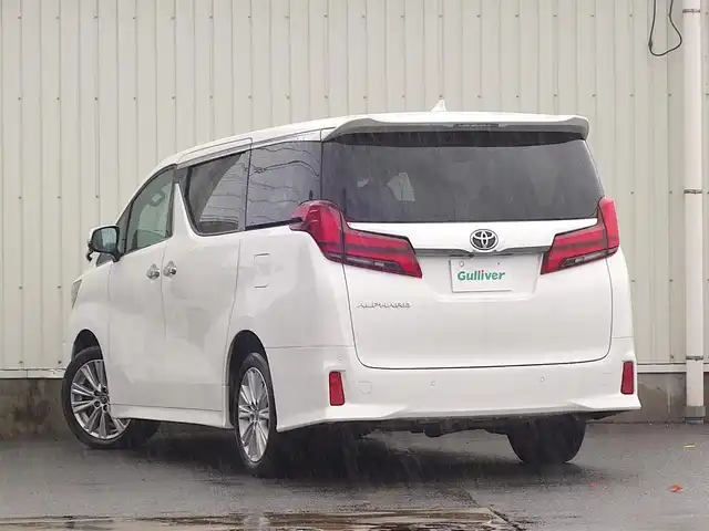 トヨタ アルファード S 山形県 2021(令3)年 5.6万km ホワイトパールクリスタルシャイン ４WD/衝突軽減/純正メモリナビ/　　【BT　フルセグ　USB　Miracast】/バックカメラ/両側パワースライドドア/アダプティブクルーズコントロール/LEDオートライト/オートハイビーム/フォグランプ/レザーシートカバー/純正18インチアルミホイール/ドライブレコーダー/コーナーセンサー/アイドリングストップ/MTモード付AT/ステアリングスイッチ/フロアマット/スマートキー/ETC
