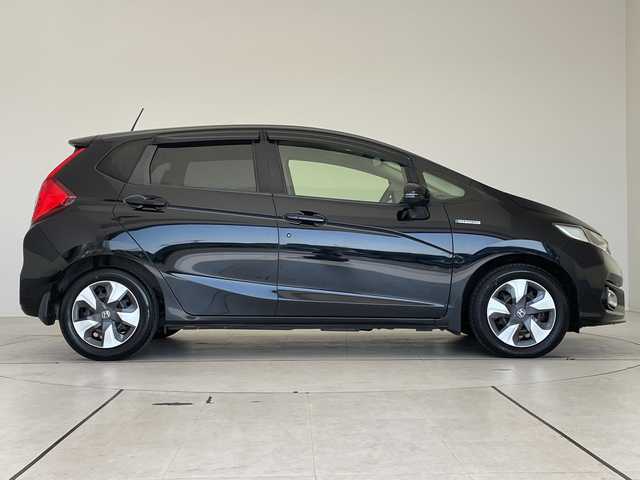 ホンダ フィット ハイブリット F 愛知県 2017(平29)年 5.3万km クリスタルブラックパール ホンダセンシング/純正ナビ/レーダークルーズコントロール/バックカメラ/純正アルミホイール/ＥＴＣ/レーンキープアシスト/オートライト/ドライブレコーダー/ステアリングスイッチ/スマートキー/プッシュスタート