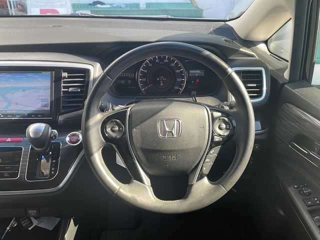 ホンダ オデッセイ アブソルート・EXホンダセンジング 京都府 2016(平28)年 6万km クリスタルブラックパール 純正８インチナビ　Ｂｌｕｅｔｏｏｔｈオーディオ　ＤＶＤ再生　フルセグ　バックカメラ　アダプティブクルーズコントロール　ブラインドスポットモニター　ビルトインＥＴＣ　ＬＥＤヘッドライト　電動シート