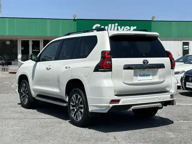 トヨタ ランドクルーザー プラド TX Lパッケージ 千葉県 2022(令4)年 4.1万km ホワイトパールクリスタルシャイン モデリスタエアロ【F/R】/サンルーフ/ベージュレザーシート/ALPINEビッグX11インチフローティングナビ/・CD/DVD/MSV/Bluetooth/フルセグ/バックカメラ/前席パワーシート/前席シートヒーター/前席シートベンチレーション/トヨタセーフティーセンス/・プリクラッシュセーフティー/・レーンディパーチャーアラート/・オートマチックハイビーム/・ロードサインアシスト/・アダプティブクルーズコントロール/スマートキー/コーナーセンサー/純正19インチアルミホイール/ETC/純正LEDヘッドライト/フォグランプ/本革巻きステアリング/木目調パネル/ルーフレール/クロームリヤガーニッシュ/サイド＆カーテンエアバッグ/新車時保証書＆取扱説明書