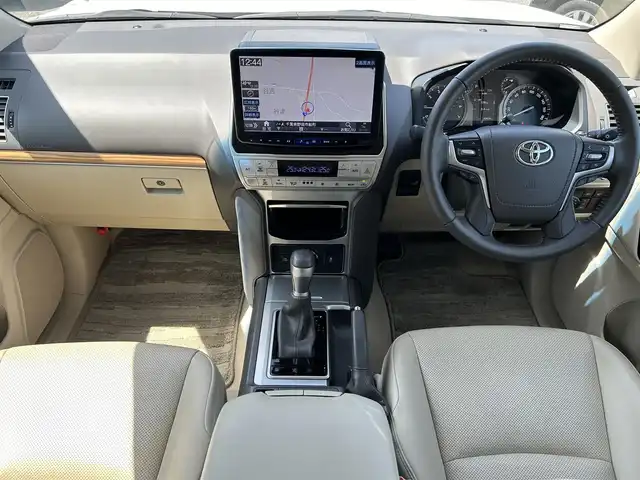 トヨタ ランドクルーザー プラド TX Lパッケージ 千葉県 2022(令4)年 4.1万km ホワイトパールクリスタルシャイン モデリスタエアロ【F/R】/サンルーフ/ベージュレザーシート/ALPINEビッグX11インチフローティングナビ/・CD/DVD/MSV/Bluetooth/フルセグ/バックカメラ/前席パワーシート/前席シートヒーター/前席シートベンチレーション/トヨタセーフティーセンス/・プリクラッシュセーフティー/・レーンディパーチャーアラート/・オートマチックハイビーム/・ロードサインアシスト/・アダプティブクルーズコントロール/スマートキー/コーナーセンサー/純正19インチアルミホイール/ETC/純正LEDヘッドライト/フォグランプ/本革巻きステアリング/木目調パネル/ルーフレール/クロームリヤガーニッシュ/サイド＆カーテンエアバッグ/新車時保証書＆取扱説明書