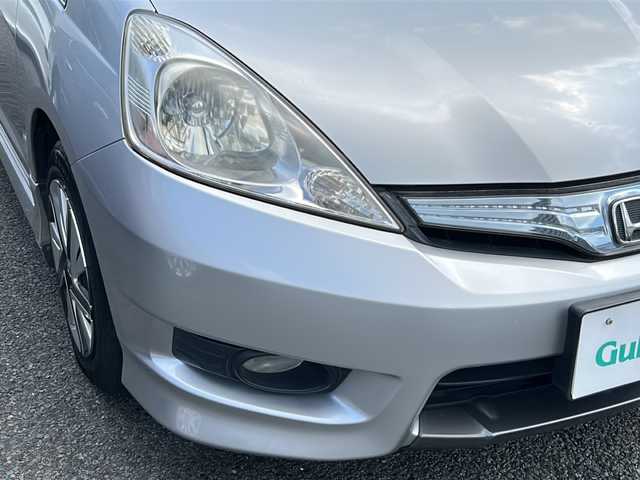 ホンダ フィット シャトル ハイブリッド ナビプレミアムセレ 東京都 2011(平23)年 8.8万km アラバスターシルバーメタリック HDDナビ/ワンセグテレビ/バックカメラ/クルーズコントロール/ETC/ハーフレザー/カーテンエアバック