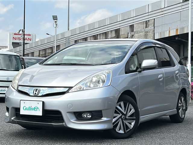 ホンダ フィット シャトル ハイブリッド ナビプレミアムセレ 東京都 2011(平23)年 8.8万km アラバスターシルバーメタリック HDDナビ/ワンセグテレビ/バックカメラ/クルーズコントロール/ETC/ハーフレザー/カーテンエアバック