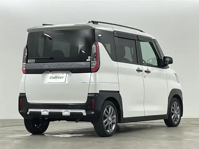 三菱 デリカミニ T プレミアム 福島県 2024(令6)年 2.9万km アメジストブラック/シルキーホワイト レンタアップ/三菱e-Assist/・衝突被害軽減ブレーキシステム（歩行者検知付き）/・オートマチックハイビーム/・車線逸脱警報システム&車線逸脱防止支援機能/・ふらつき警報/マイパイロット/・レーダークルーズコントロール（全車速追従機能付き）/・車線維持支援機能/・マルチアラウンドモニター（移動物検知機能付き）/・デジタルルームミラー（マルチアラウンドモニター付き）/メモリナビ/・型番：不明/・AM/FM/CD/DVD/BT/HDMI/フルセグTV/・全方位カメラ/・ETC/両側パワースライドドア/電子パーキングブレーキ/・オートブレーキホールド/アイドリングストップ/プッシュスタート/・スマートキー/ルーフレール/ハーフレザーシート/・シートヒーター/・ベンチシート/純正フロアマット