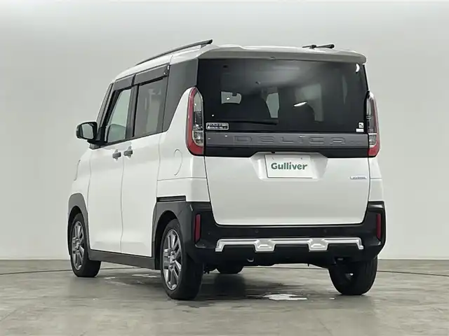 三菱 デリカミニ T プレミアム 福島県 2024(令6)年 2.9万km アメジストブラック/シルキーホワイト レンタアップ/三菱e-Assist/・衝突被害軽減ブレーキシステム（歩行者検知付き）/・オートマチックハイビーム/・車線逸脱警報システム&車線逸脱防止支援機能/・ふらつき警報/マイパイロット/・レーダークルーズコントロール（全車速追従機能付き）/・車線維持支援機能/・マルチアラウンドモニター（移動物検知機能付き）/・デジタルルームミラー（マルチアラウンドモニター付き）/メモリナビ/・型番：不明/・AM/FM/CD/DVD/BT/HDMI/フルセグTV/・全方位カメラ/・ETC/両側パワースライドドア/電子パーキングブレーキ/・オートブレーキホールド/アイドリングストップ/プッシュスタート/・スマートキー/ルーフレール/ハーフレザーシート/・シートヒーター/・ベンチシート/純正フロアマット