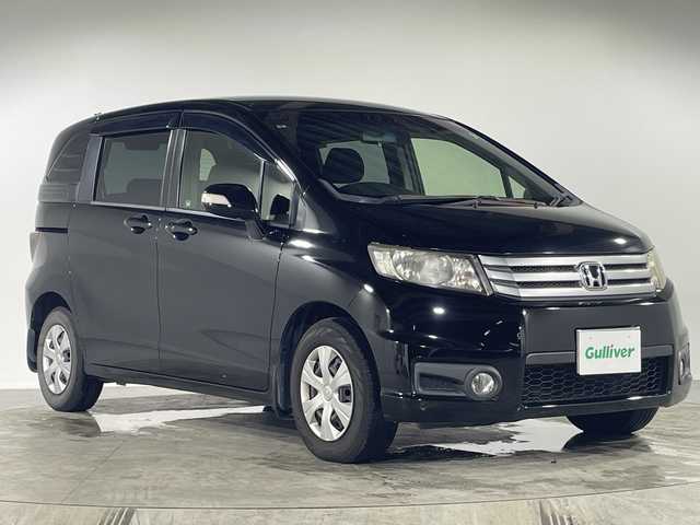 ホンダ フリード スパイク G ジャストセレクション 福岡県 2013(平25)年 10万km プレミアムスパークルブラックパール 社外７型SDナビ（ワンセグTV/CD/AM/FM）バックモニターETCフォグランプHIDヘッドライトスマートキー×２左側パワスラ電動格納ミラー横滑り防止