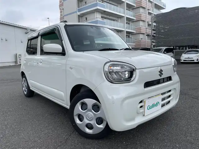 スズキ アルト L 静岡県 2023(令5)年 0.3万km ピュアホワイトP ワンオーナー/登録時2251キロ/純正ディスプレイオーディオ/USB/Bluetooth/バックカメラ/セーフティサポート（予防安全技術）/・デュアルカメラブレーキサポート/・誤発進抑制機能/・後方誤発進抑制機能/・車線逸脱警報機能/・ふらつき警報機能/・先行車発進お知らせ機能/・ハイビームアシスト/アイドリングストップ/LEDライト/前席シートヒーター/純正フロアマット/ドアバイザー/キーレス/スペアキー/新車時保証書/取扱説明書