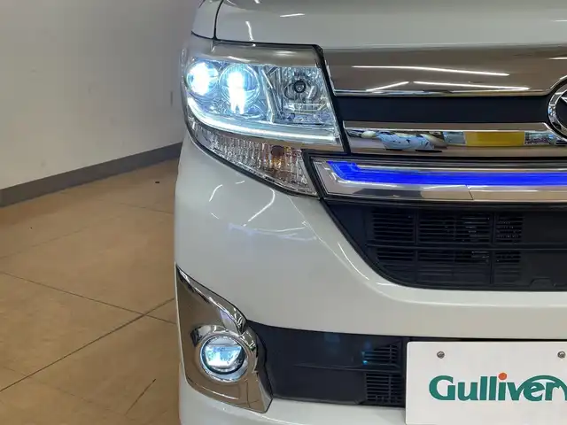 ダイハツ タント カスタム RS トップED SAⅡ 群馬県 2015(平27)年 5.7万km パールホワイトⅢ ダイハツスマートアシストII/・衝突回避支援ブレーキ/・車線逸脱警報機能/・横滑り防止/・オートライト/純正8インチメーカーナビ/　AM/FM/DVD/TV（フルセグ）/Bluetooth/ipod/純正15インチAW/純正フロアマット/純正ドライブレコーダー/ターボチャージャー/衝突安全ボディ/両側パワースライドドア/電動格納ミラー/アイドリングストップ/ビルトインETC/スマートキー/プッシュスタート/LEDヘッドランプ/全席ハーフレザーシート/本革巻きステアリング/ステアリングスイッチ/USB入力端子/HDML入力端子/AAC