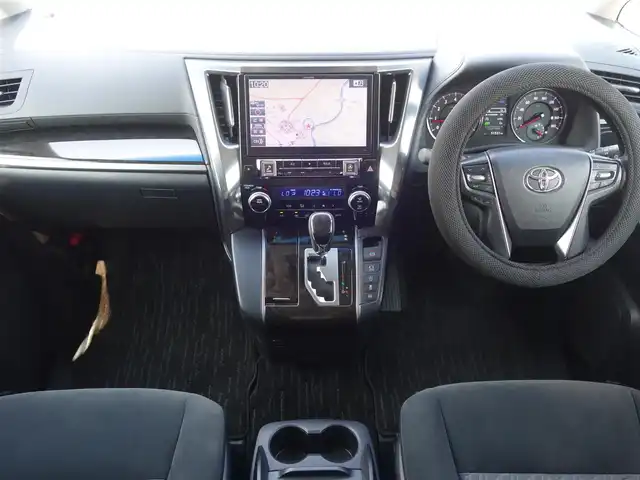 トヨタ ヴェルファイア Z 山形県 2015(平27)年 5.2万km バーニングブラッククリスタルシャインガラスフレーク 4WD/メモリナビ/　　【CD DVD BT フルセグ USB】/バックカメラ/パワースライドドア/LEDオートヘッドライト/オットマン/純正18インチアルミホイール/アイドリングストップ/コーナーセンサー/ステアリングスイッチ/MTモード付AT/電動格納ウィンカーミラー/フォグランプ/フロアマット/ドアバイザ―/スマートキー/ETC
