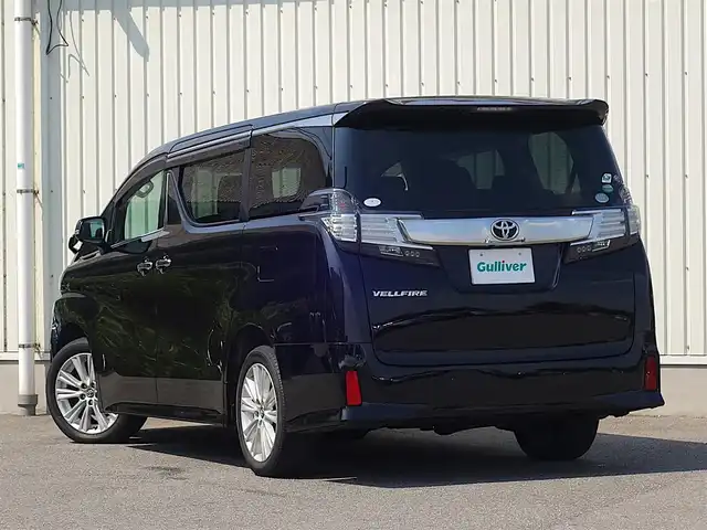 トヨタ ヴェルファイア Z 山形県 2015(平27)年 5.2万km バーニングブラッククリスタルシャインガラスフレーク 4WD/メモリナビ/　　【CD DVD BT フルセグ USB】/バックカメラ/パワースライドドア/LEDオートヘッドライト/オットマン/純正18インチアルミホイール/アイドリングストップ/コーナーセンサー/ステアリングスイッチ/MTモード付AT/電動格納ウィンカーミラー/フォグランプ/フロアマット/ドアバイザ―/スマートキー/ETC