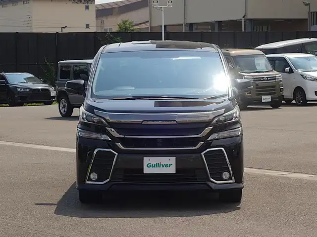 トヨタ ヴェルファイア Z 山形県 2015(平27)年 5.2万km バーニングブラッククリスタルシャインガラスフレーク 4WD/メモリナビ/　　【CD DVD BT フルセグ USB】/バックカメラ/パワースライドドア/LEDオートヘッドライト/オットマン/純正18インチアルミホイール/アイドリングストップ/コーナーセンサー/ステアリングスイッチ/MTモード付AT/電動格納ウィンカーミラー/フォグランプ/フロアマット/ドアバイザ―/スマートキー/ETC