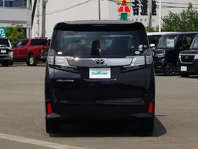 トヨタ ヴェルファイア Z 山形県 2015(平27)年 5.2万km バーニングブラッククリスタルシャインガラスフレーク 4WD/メモリナビ/　　【CD DVD BT フルセグ USB】/バックカメラ/パワースライドドア/LEDオートヘッドライト/オットマン/純正18インチアルミホイール/アイドリングストップ/コーナーセンサー/ステアリングスイッチ/MTモード付AT/電動格納ウィンカーミラー/フォグランプ/フロアマット/ドアバイザ―/スマートキー/ETC