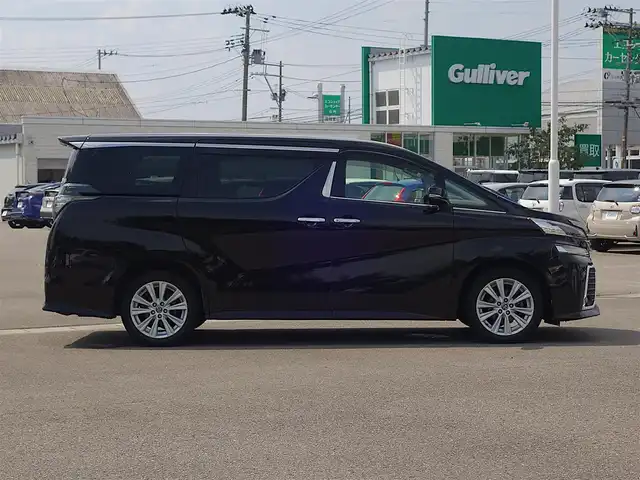 トヨタ ヴェルファイア Z 山形県 2015(平27)年 5.2万km バーニングブラッククリスタルシャインガラスフレーク 4WD/メモリナビ/　　【CD DVD BT フルセグ USB】/バックカメラ/パワースライドドア/LEDオートヘッドライト/オットマン/純正18インチアルミホイール/アイドリングストップ/コーナーセンサー/ステアリングスイッチ/MTモード付AT/電動格納ウィンカーミラー/フォグランプ/フロアマット/ドアバイザ―/スマートキー/ETC