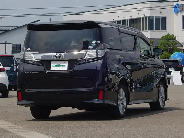 トヨタ ヴェルファイア Z 山形県 2015(平27)年 5.2万km バーニングブラッククリスタルシャインガラスフレーク 4WD/メモリナビ/　　【CD DVD BT フルセグ USB】/バックカメラ/パワースライドドア/LEDオートヘッドライト/オットマン/純正18インチアルミホイール/アイドリングストップ/コーナーセンサー/ステアリングスイッチ/MTモード付AT/電動格納ウィンカーミラー/フォグランプ/フロアマット/ドアバイザ―/スマートキー/ETC